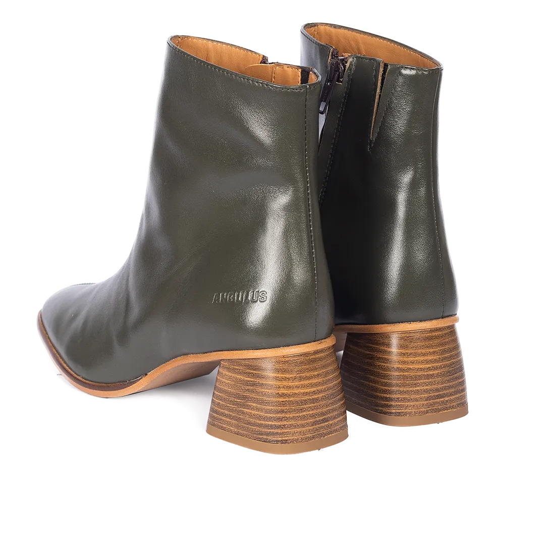 Boot with sculptural wooden heel